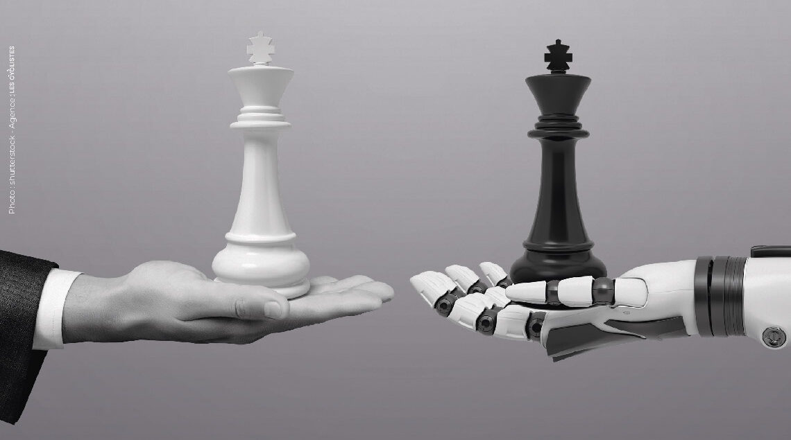 Une main humaine et une maind e robot ( IA ) avec des pièces d'échec, Eleven